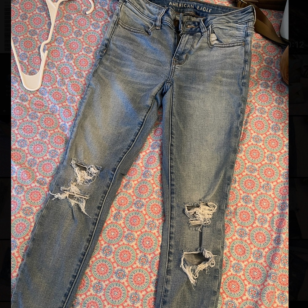 Selling These ripped jeans from American Eagle , only wore once ! Nice style .